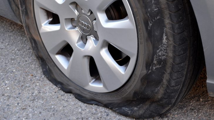 punctured tyre - flat tyre